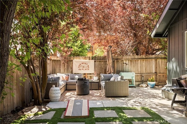 345 Maple Dr, Lake Arrowhead, CA 92352 - fenced backyard with an outdoor living space and a patio area