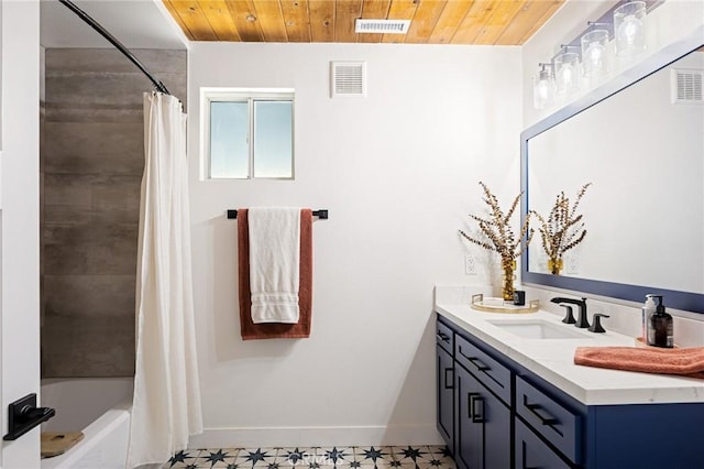 345 Maple Dr, Lake Arrowhead, CA 92352 - bathroom with double vanity, wood ceiling, shower / bath combo with shower curtain, and tile patterned floors