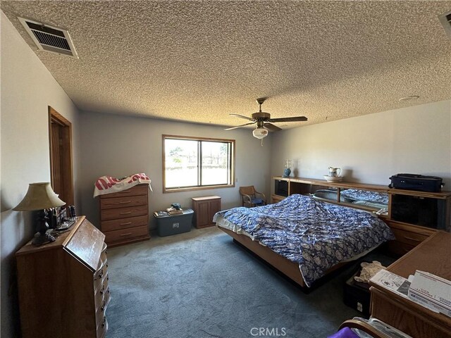 18211 Hercules St, Hesperia, CA 92345 - carpeted bedroom with a textured ceiling and a ceiling fan