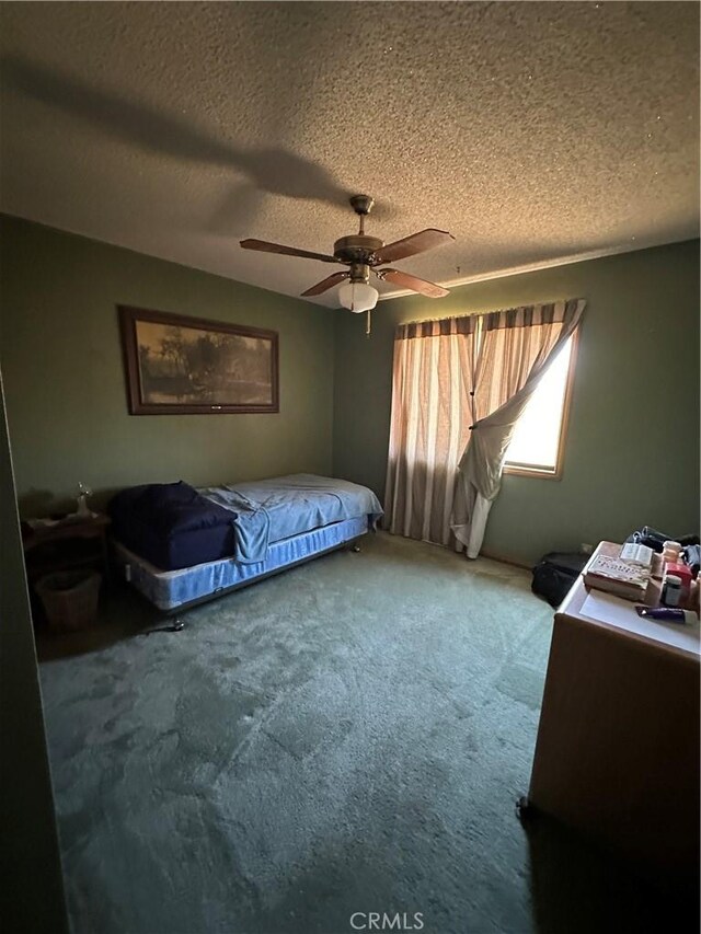 18211 Hercules St, Hesperia, CA 92345 - carpeted bedroom featuring a textured ceiling and ceiling fan