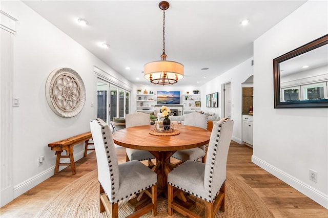 2726 Cardinal Dr, Costa Mesa, CA 92626 - dining space with a chandelier, light wood-type flooring, and recessed lighting