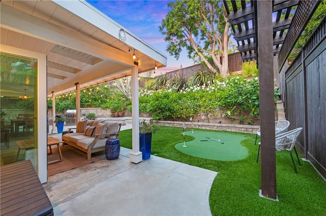 2726 Cardinal Dr, Costa Mesa, CA 92626 - fenced backyard with a putting green and a patio area