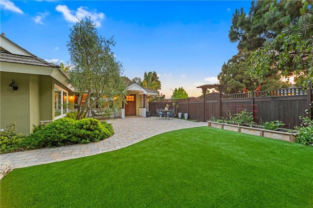 2726 Cardinal Dr, Costa Mesa, CA 92626 - yard at dusk featuring a patio area