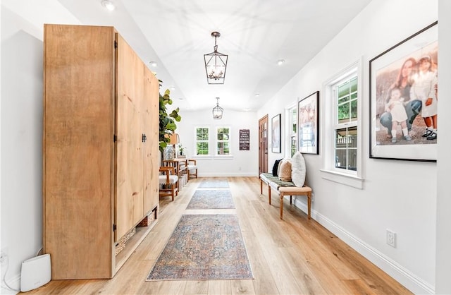 2726 Cardinal Dr, Costa Mesa, CA 92626 - hall featuring light wood-type flooring, a chandelier, and recessed lighting