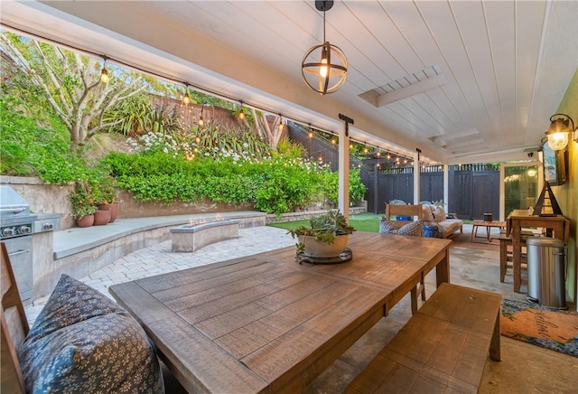2726 Cardinal Dr, Costa Mesa, CA 92626 - fenced backyard featuring a patio area, grilling area, outdoor dining space, and an outdoor fire pit