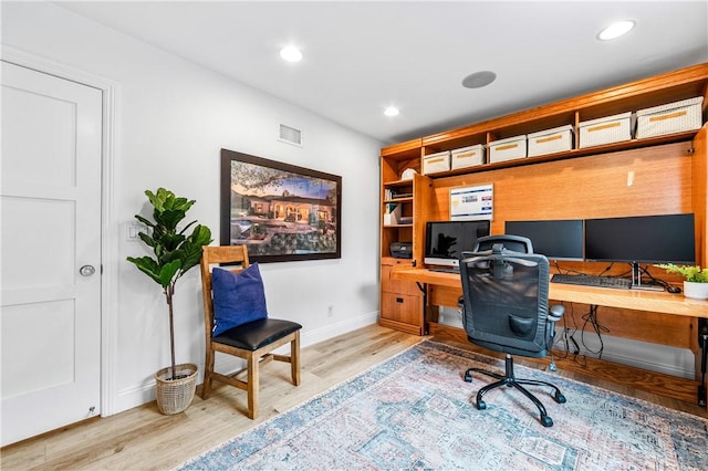 2726 Cardinal Dr, Costa Mesa, CA 92626 - home office featuring built in desk, wood finished floors, and recessed lighting