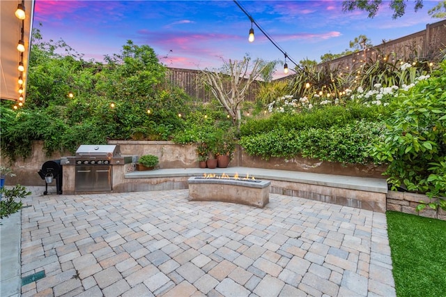 2726 Cardinal Dr, Costa Mesa, CA 92626 - fenced backyard with a fire pit, a patio, and area for grilling