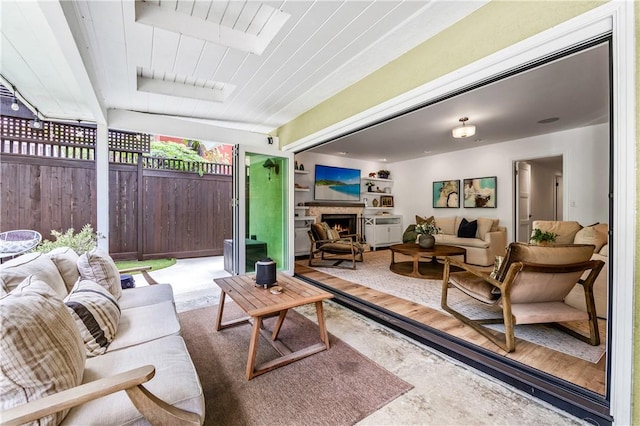 2726 Cardinal Dr, Costa Mesa, CA 92626 - living room featuring a lit fireplace