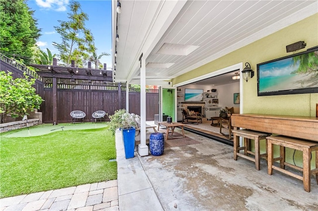 2726 Cardinal Dr, Costa Mesa, CA 92626 - fenced backyard featuring a putting area and a patio