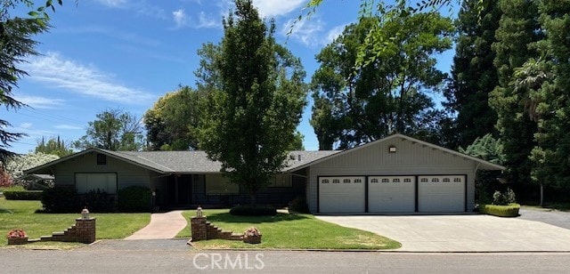 2805 Forist Ln, Merced, CA 95340 - single story home with driveway, a garage, and a front lawn