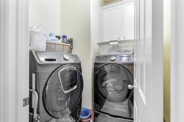 3871 Bur Oak Rd, San Bernardino, CA 92407 - laundry area with independent washer and dryer and cabinet space