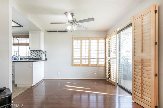 18110 Erik Ct Unit 593, Canyon Country, CA 91387 - unfurnished living room with wood finished floors and ceiling fan
