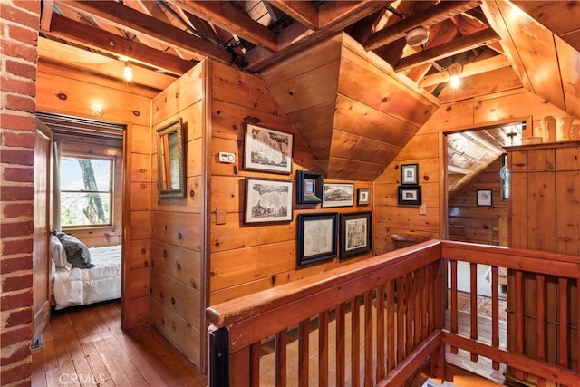 600 Rose Ln, Twin Peaks, CA 92391 - hall with wood-type flooring, wooden walls, and lofted ceiling