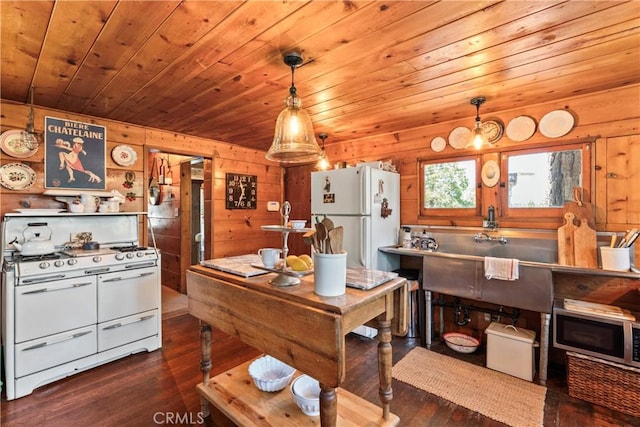 600 Rose Ln, Twin Peaks, CA 92391 - kitchen with white appliances, wood walls, wooden ceiling, dark wood-style floors, and pendant lighting