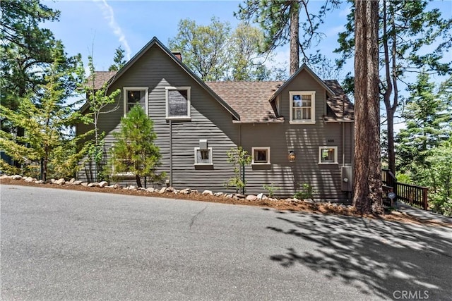 600 Rose Ln, Twin Peaks, CA 92391 - view of side of property with a chimney