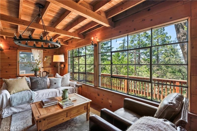 600 Rose Ln, Twin Peaks, CA 92391 - living room with a wood ceiling with exposed beams, wood walls, and a chandelier