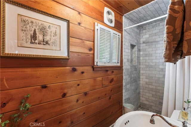 600 Rose Ln, Twin Peaks, CA 92391 - bathroom with wooden walls, a tile shower, and a bathtub