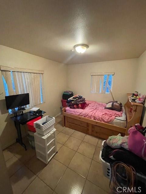 8014 Morton Ave, Los Angeles, CA 90001 - bedroom featuring light tile patterned flooring