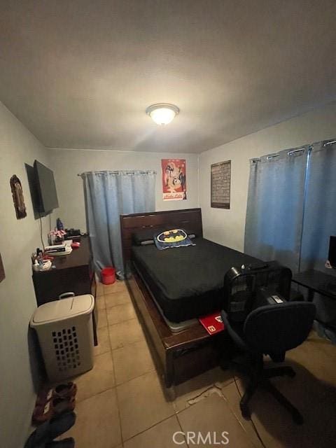 8014 Morton Ave, Los Angeles, CA 90001 - bedroom featuring light tile patterned floors