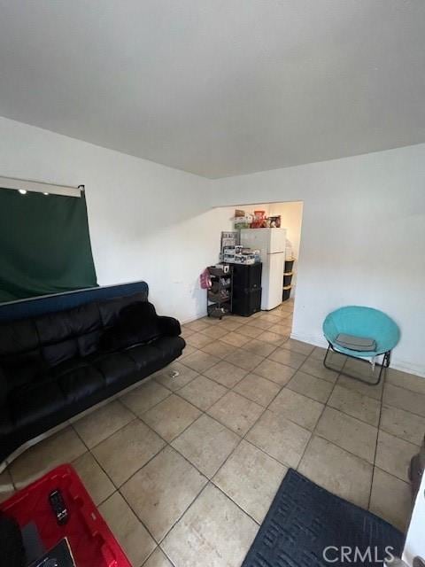 8014 Morton Ave, Los Angeles, CA 90001 - living room featuring light tile patterned floors