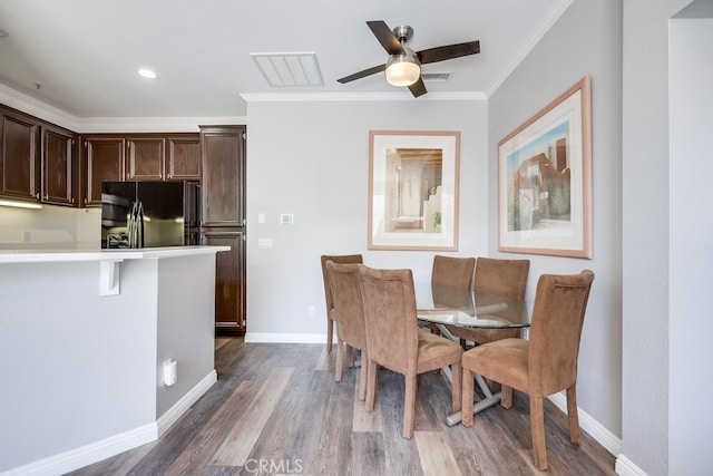 376 Gullotti Pl, Placentia, CA 92870 - dining room with crown molding, dark wood-type flooring, and ceiling fan
