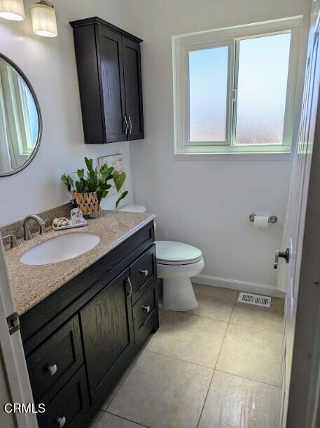 21613 Mountain Dr, Tehachapi, CA 93561 - bathroom featuring vanity and tile patterned flooring