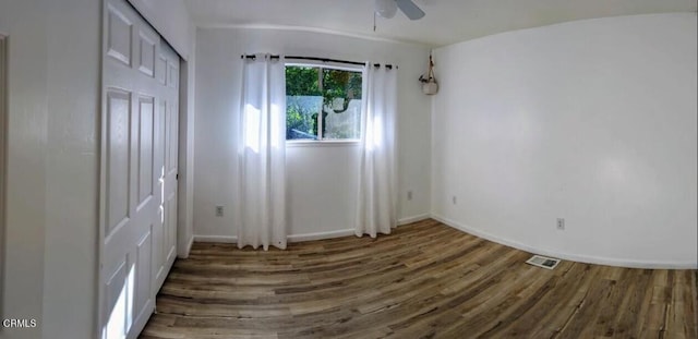 21613 Mountain Dr, Tehachapi, CA 93561 - unfurnished bedroom featuring wood finished floors, a closet, and ceiling fan