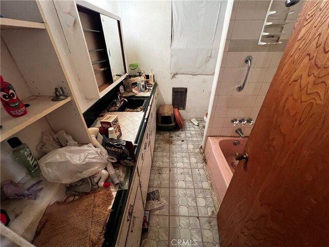 12449 6th St, Yucaipa, CA 92399 - bathroom featuring tile patterned floors and shower / bath combination