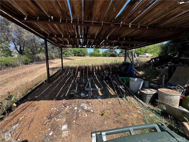 12449 6th St, Yucaipa, CA 92399 - view of patio with a carport