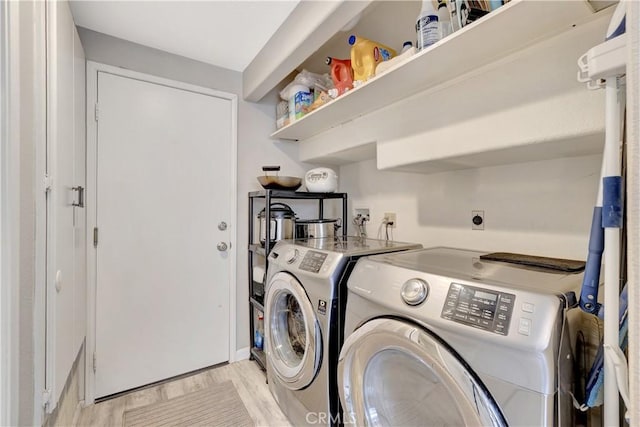 30042 Oceanus, Laguna Niguel, CA 92677 - laundry room with washing machine and dryer and light wood finished floors