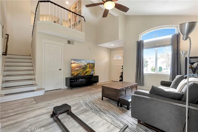30042 Oceanus, Laguna Niguel, CA 92677 - living area featuring ceiling fan, stairs, wood finished floors, and high vaulted ceiling