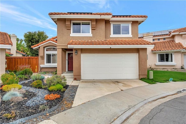 30042 Oceanus, Laguna Niguel, CA 92677 - view of front of house with a tiled roof, an attached garage, stucco siding, and driveway
