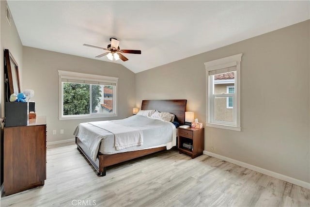 30042 Oceanus, Laguna Niguel, CA 92677 - bedroom featuring light wood-style flooring, vaulted ceiling, and ceiling fan
