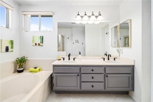 36536 Jenna Ln, Palmdale, CA 93550 - full bath with a bath, double vanity, a stall shower, and tile patterned flooring