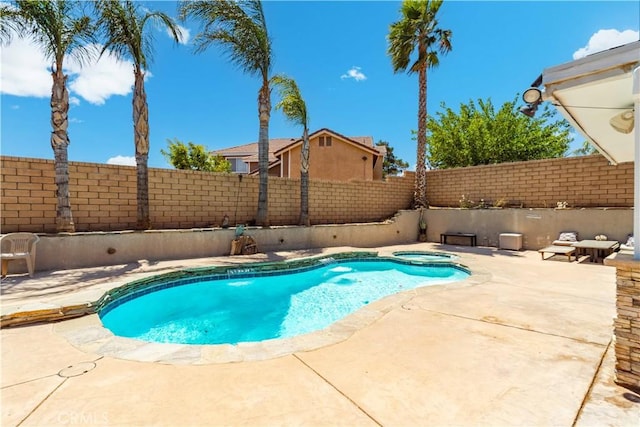 36536 Jenna Ln, Palmdale, CA 93550 - view of pool featuring a fenced backyard, a patio area, and a pool with connected hot tub