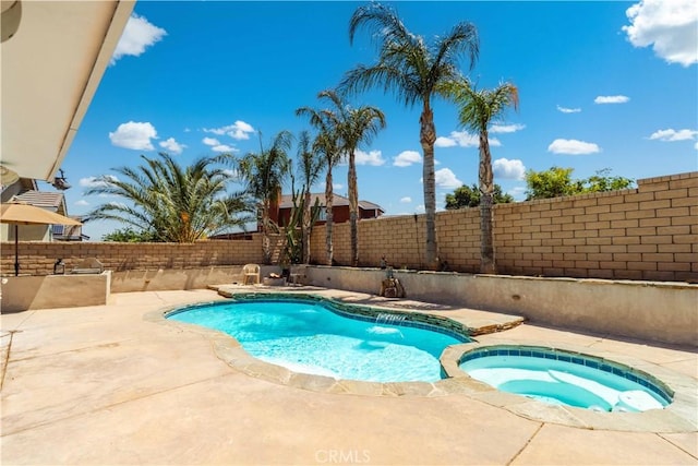 36536 Jenna Ln, Palmdale, CA 93550 - view of swimming pool featuring a fenced backyard, a patio, and a pool with connected hot tub