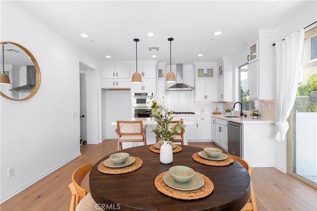 3173 Ivy Way, Rancho Mission Viejo, CA 92694 - dining area with light wood finished floors and recessed lighting