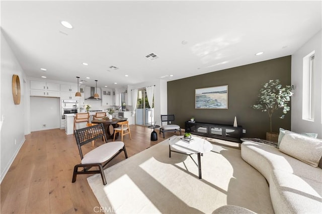 3173 Ivy Way, Rancho Mission Viejo, CA 92694 - living room with recessed lighting and light wood-type flooring