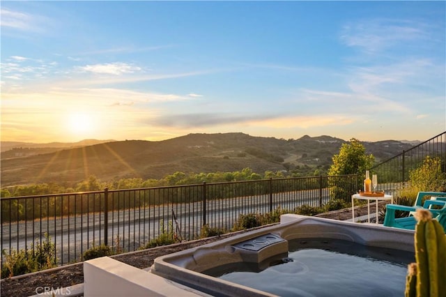 3173 Ivy Way, Rancho Mission Viejo, CA 92694 - pool at dusk with a hot tub and a water and mountain view