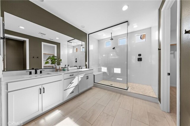 3173 Ivy Way, Rancho Mission Viejo, CA 92694 - full bath with walk in shower, double vanity, recessed lighting, and a walk in closet