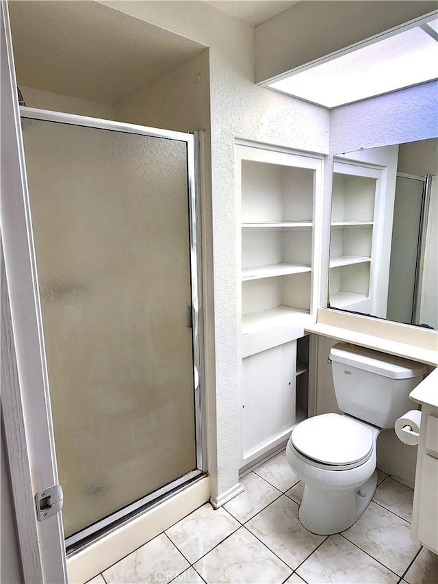 22790 Lakeway Dr Unit 461, Diamond Bar, CA 91765 - bathroom with vanity, a stall shower, tile patterned floors, and built in features