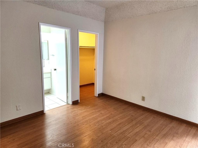 22790 Lakeway Dr Unit 461, Diamond Bar, CA 91765 - empty room with light wood-style flooring and a textured ceiling