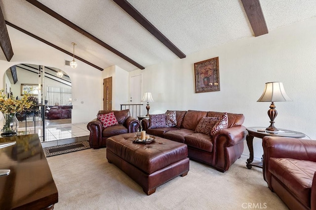 44668 13th St E, Lancaster, CA 93535 - living room featuring a textured ceiling and light carpet