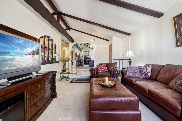 44668 13th St E, Lancaster, CA 93535 - living area with light carpet, a textured ceiling, and arched walkways