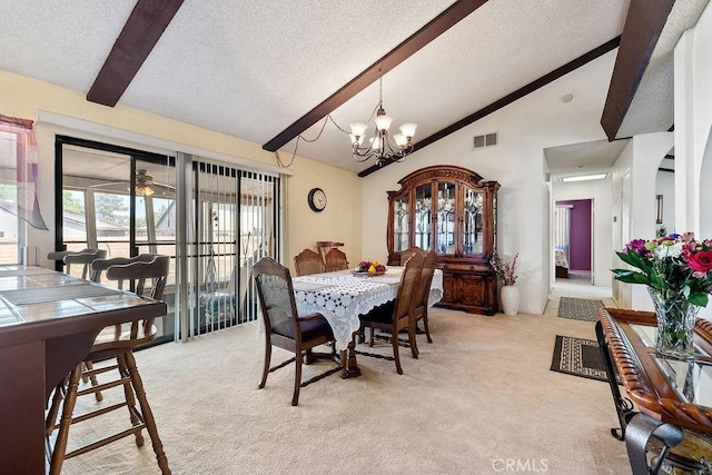 44668 13th St E, Lancaster, CA 93535 - dining space with light carpet, a textured ceiling, and a chandelier