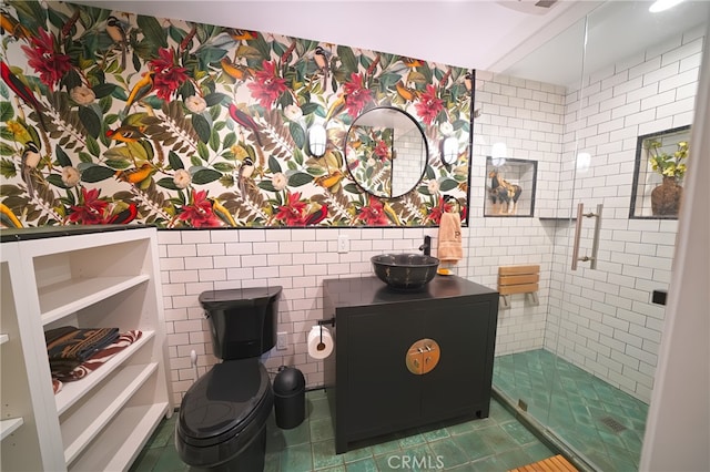 1525 N Hayworth Ave Unit 304, Los Angeles, CA 90046 - bathroom with tile patterned floors, tile walls, and vanity