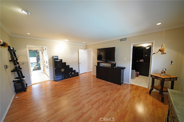 1525 N Hayworth Ave Unit 304, Los Angeles, CA 90046 - living room featuring light wood-style floors, crown molding, stairway, and recessed lighting