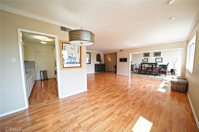 1525 N Hayworth Ave Unit 304, Los Angeles, CA 90046 - living area with crown molding and light wood-type flooring