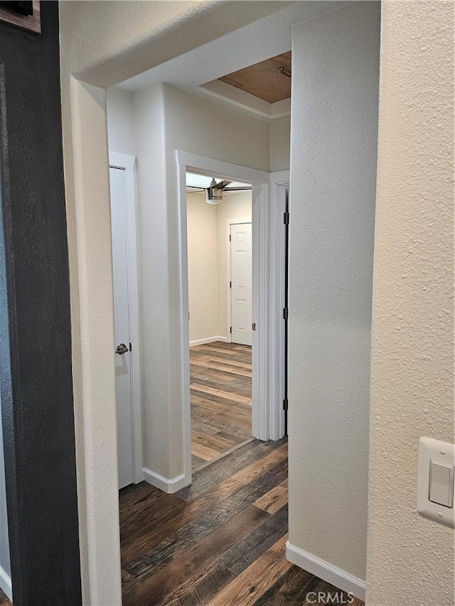 8463 California Ave, Riverside, CA 92504 - corridor featuring dark wood-style floors and a textured wall