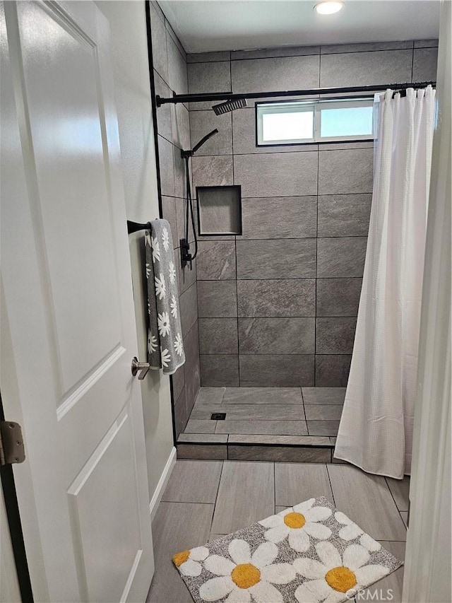 8463 California Ave, Riverside, CA 92504 - full bath with tiled shower and wood finish floors